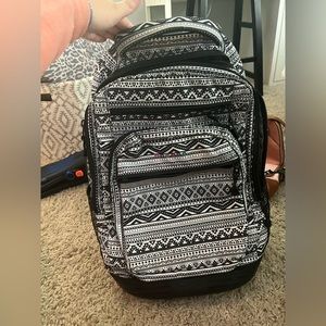 J world New York black and white rolling backpack